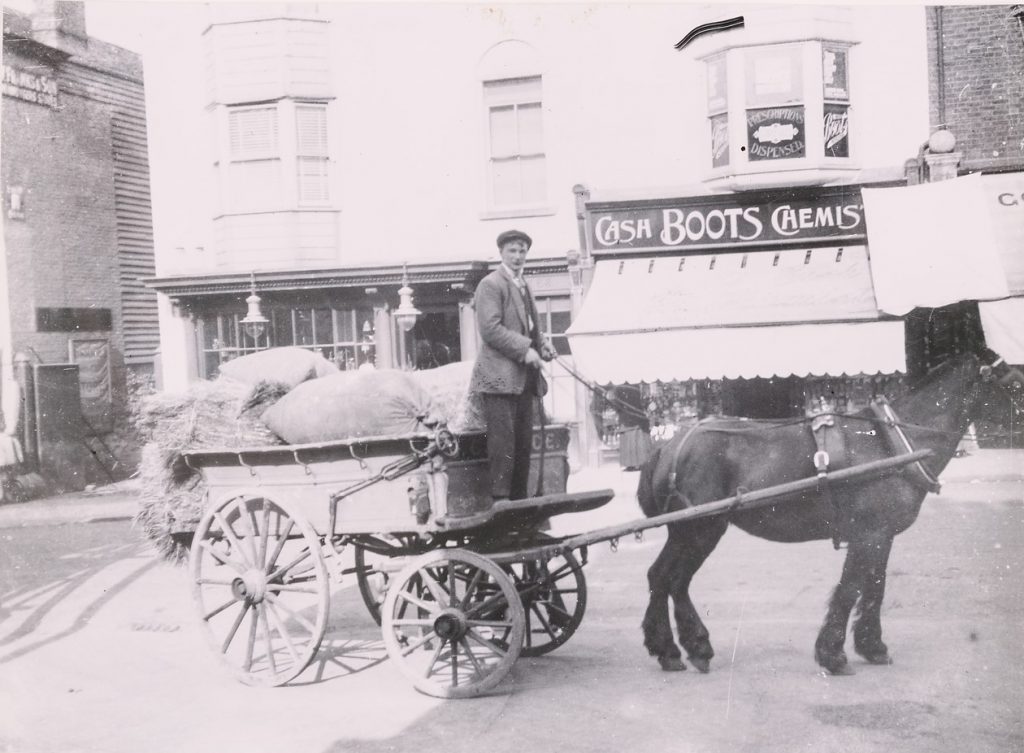 Boots chemists in Sevenoaks with horse and cart in front