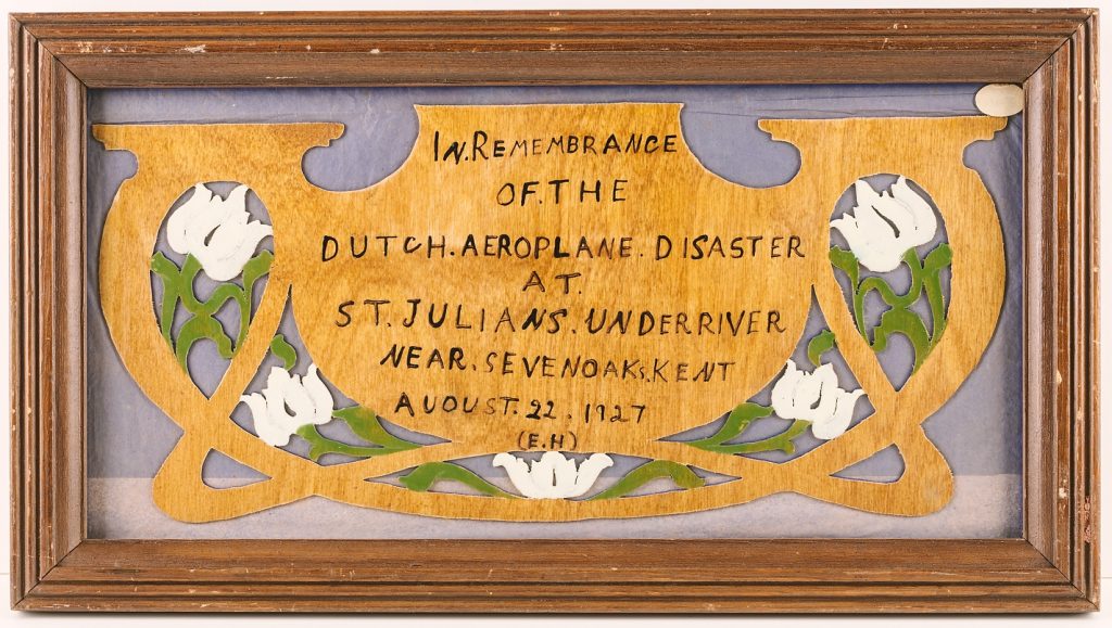 Commemorative carving with tulip design, © Kent County Council Sevenoaks Museum