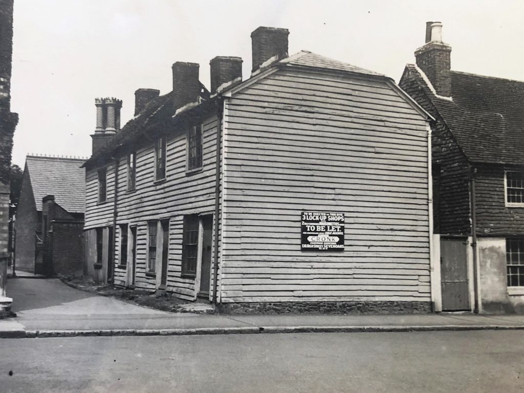 Black and white photo of weatherboard houses