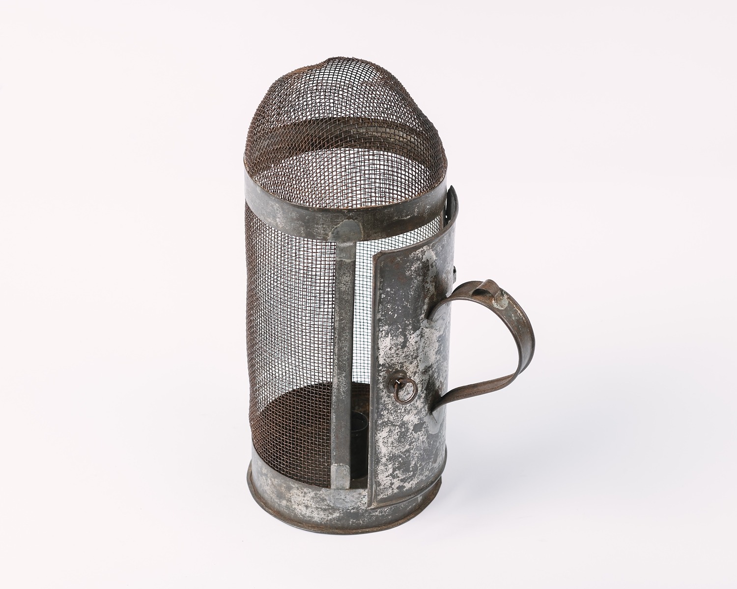 Caged metal candlestick