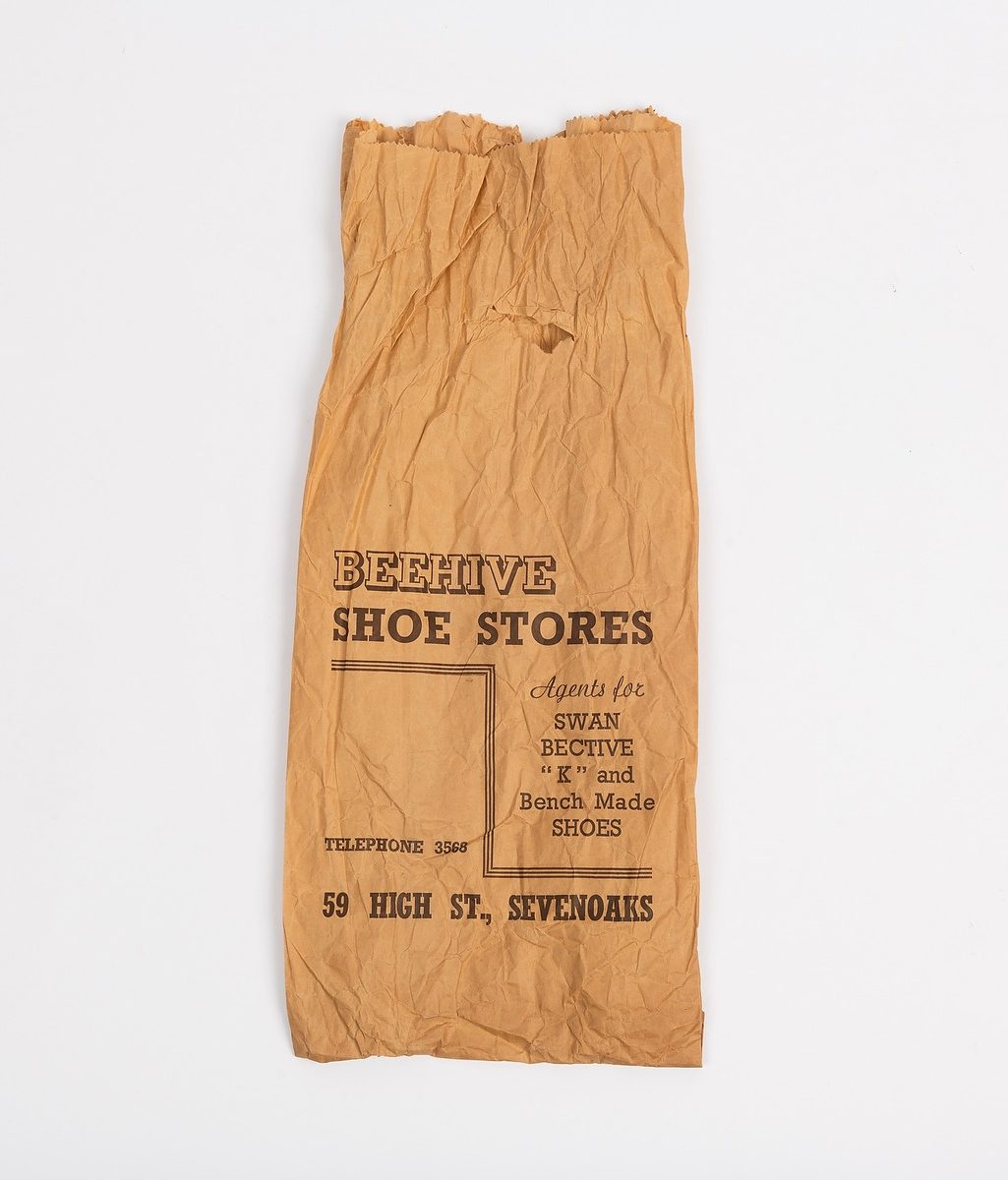 Brown paper bag with printed text