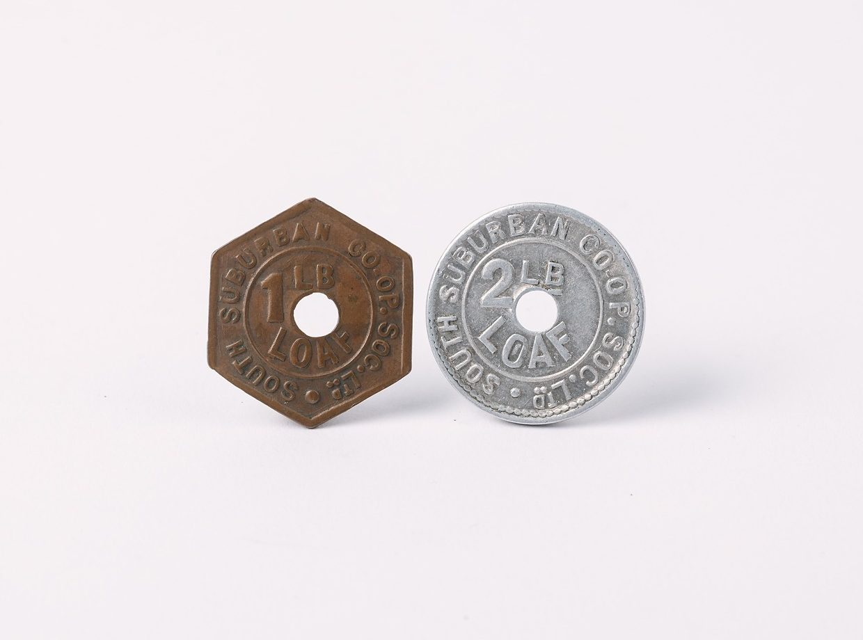 South Suburban Cooperative Society bread tokens 1LB and 2LB, one copper, one aluminium